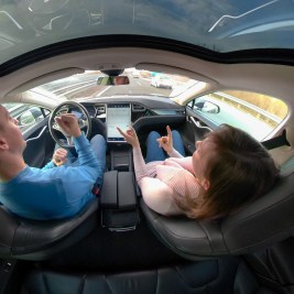 Couple in self-driving car