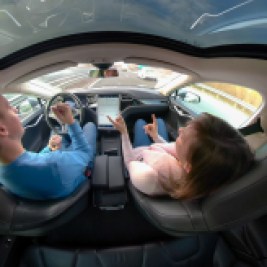 Couple in self-driving car