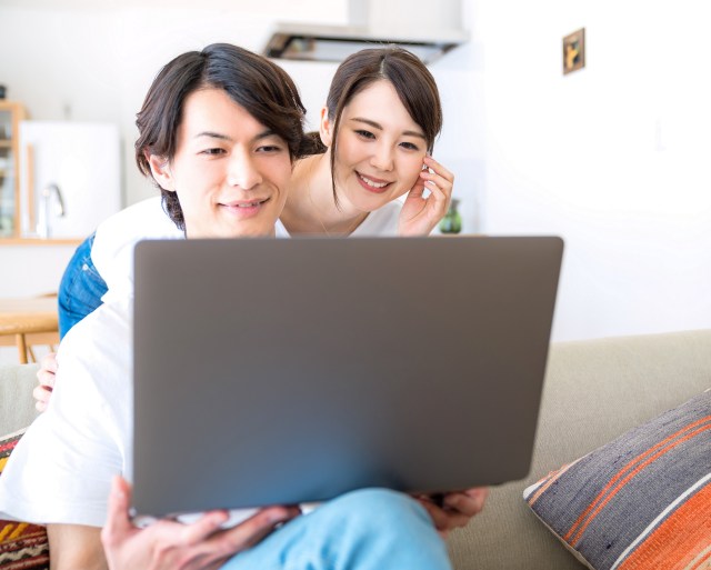 Couple working on a laptop computer