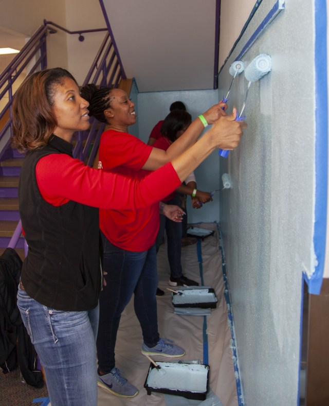 Volunteers painting