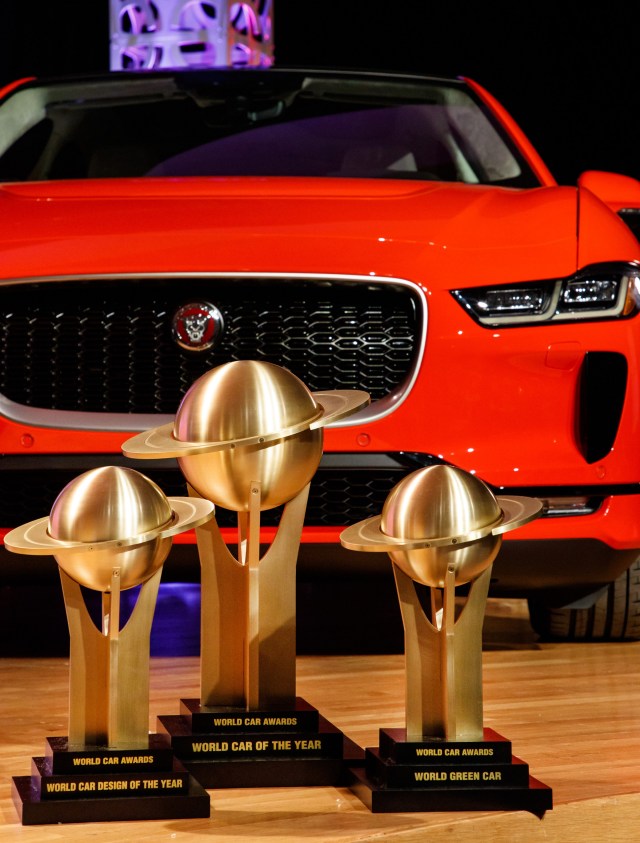 Jaguar I-PACE with three trophies