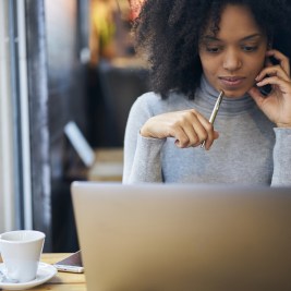 Woman working on financial health on computer