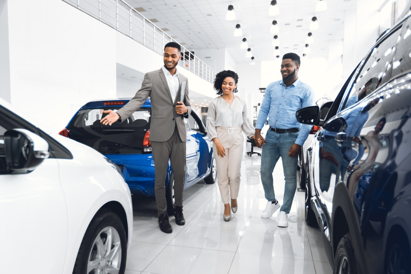 Couple with car salesman