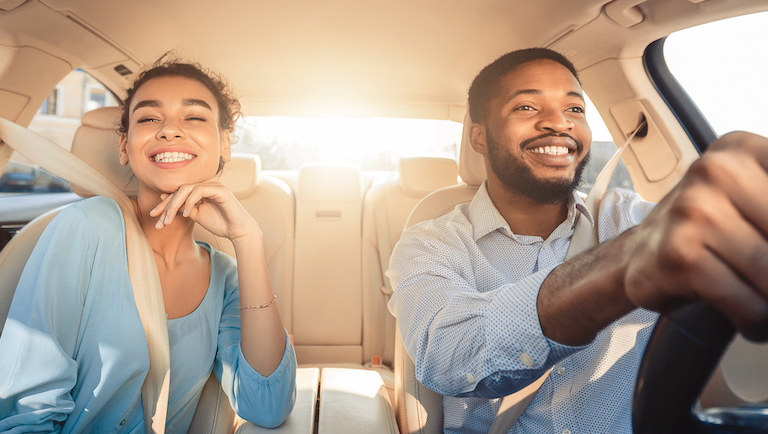 couple driving in car