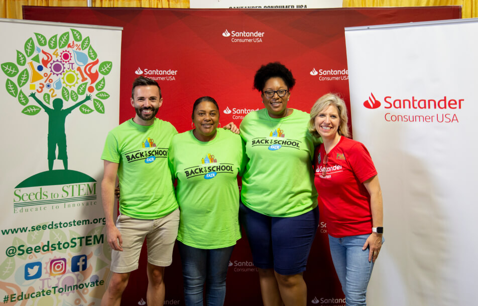Santander Consumer USA employees at a Back to School charity event