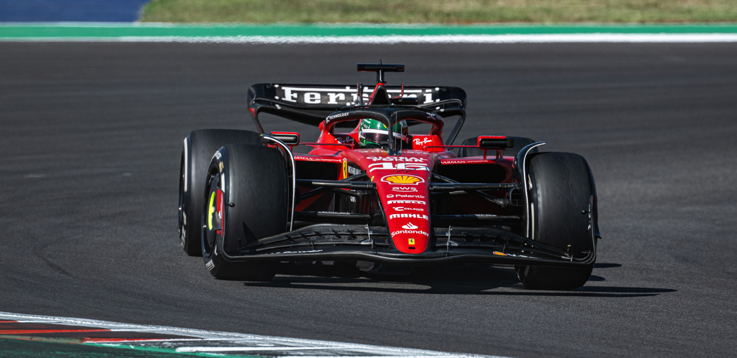 Charles Leclerc is his Ferrari Formula 1 race car.