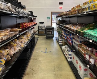 Aisle filled with food at Jubilee Park Food Pantry