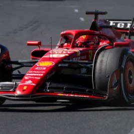 Formula 1 Ferrari car driven by Charles Lecelerc on the track.